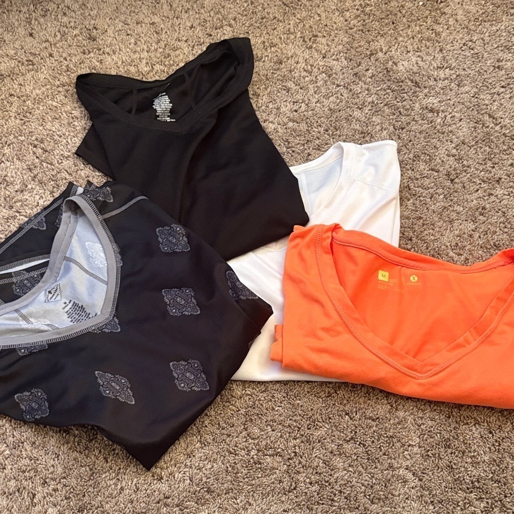 Set of Black, White, and Orange V-Neck Tops